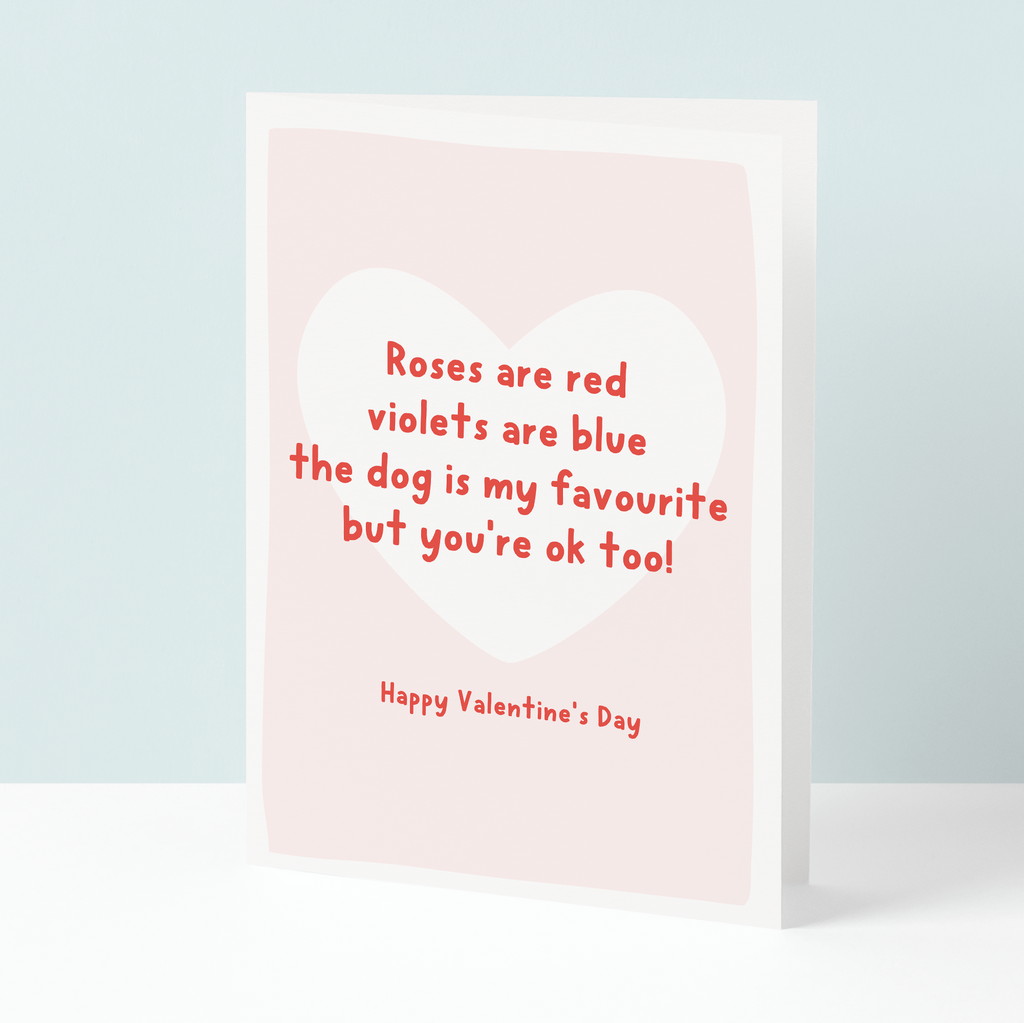 Valentine's Day card with red text on a light pink background